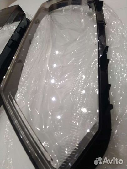 Стекло фары Фольксваген Тигуан 1