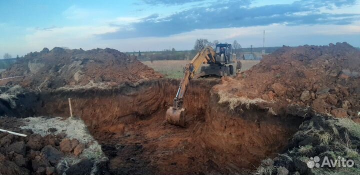 Услуги экскаватора ек18т