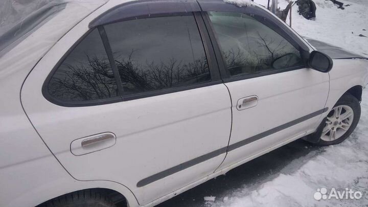 Дверь nissan sunny fb15