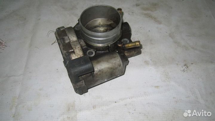 Дроссельная заслонка Ауди Фольксваген 06A133062D