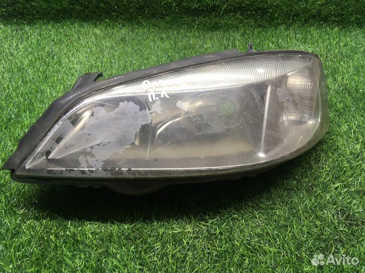 Фара левая Opel Astra G