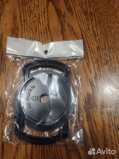 Универсальный держатель крышки фотоаппарата