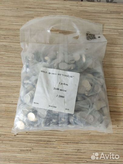 Монеты в банковском мешке