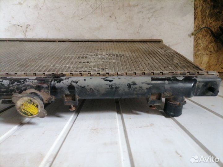 Радиатор охлаждения двигателя Nissan Primera P11