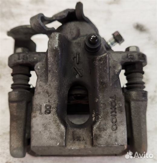 Суппорт тормозной задний правый Toyota Prius ZVW30