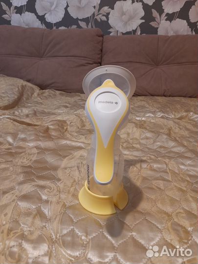Молокоотсос medela ручной