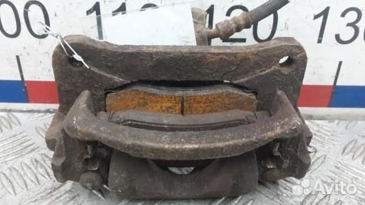 Суппорт тормозной задний левый toyota land cruiser