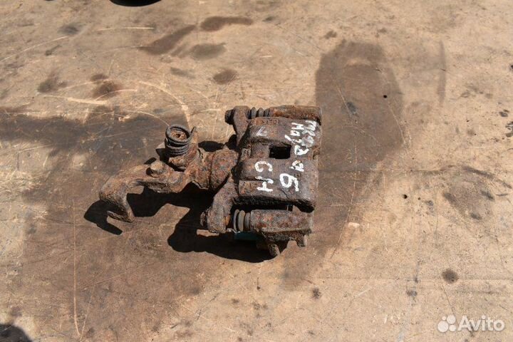 Суппорт тормозной задний левый Mazda 6 GH L813