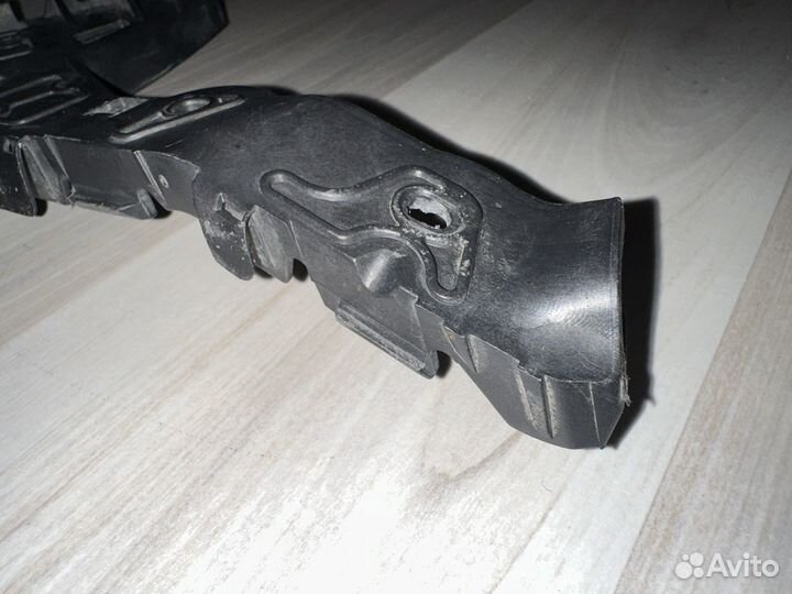 Кронштейн переднего бампера Opel Astra H (левый)