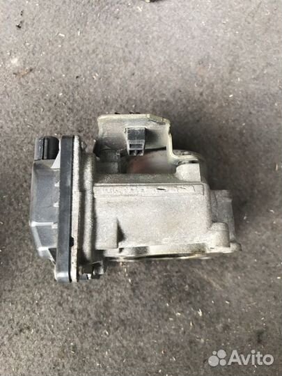 Дросельная заслонка Mazda Demio