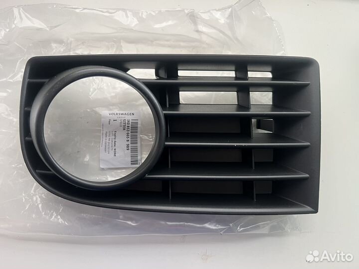 Новая решетка бампера левая VW Golf 5 1K0853665B