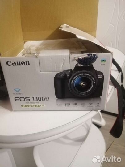 Зеркальный фотоаппарат Canon 1300D