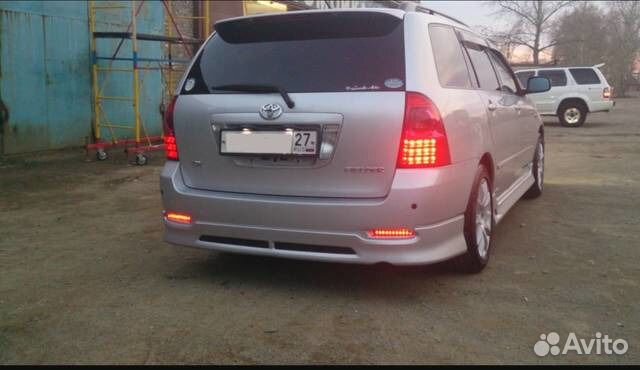 Накладка на задний бампер рестайл Corolla 121