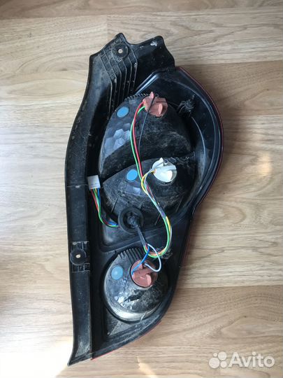 Фонарь chevrolet spark битый