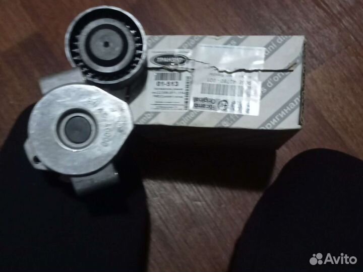 Натяжной ролик