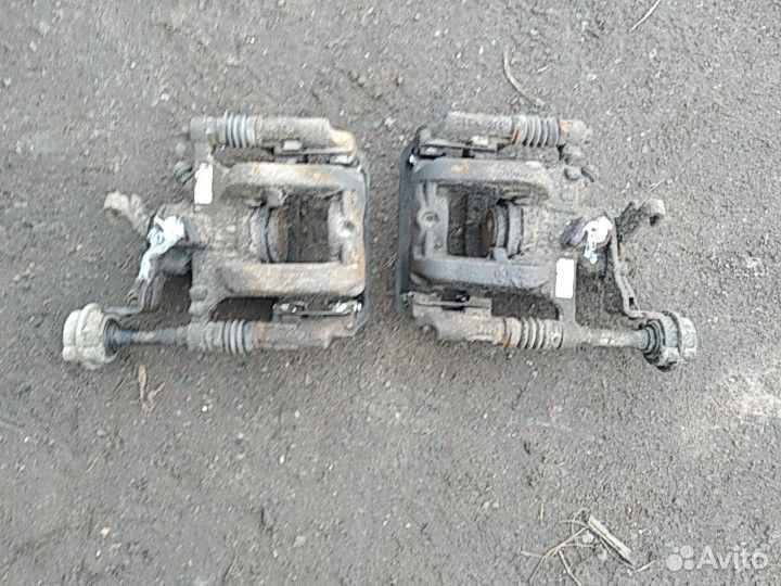 Суппорт задний Opel Astra J GTC