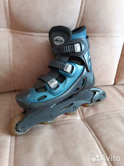 Роликовые коньки