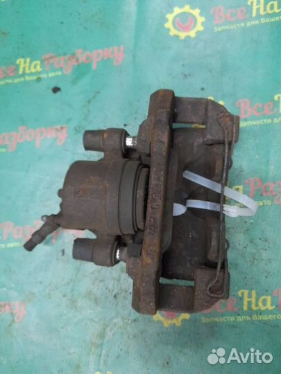 Суппорт передний левый Mazda 3-Series хечбэк 1.6Л