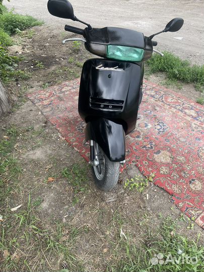 Скутер хонда лид