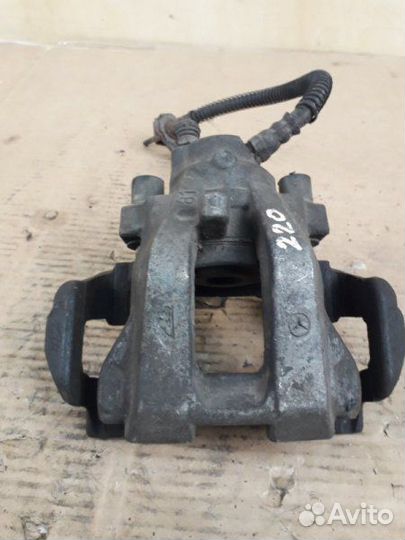 Суппорт тормозной задний левый Mercedes-Benz