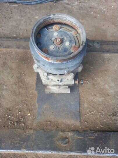 Компрессор кондиционера Mitsubishi Lancer 7