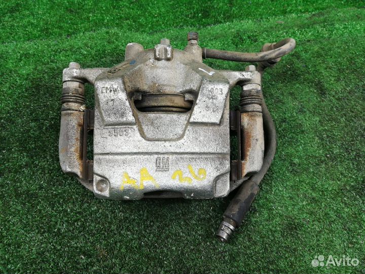 Суппорт тормозной передний правый Chevrolet Tracke