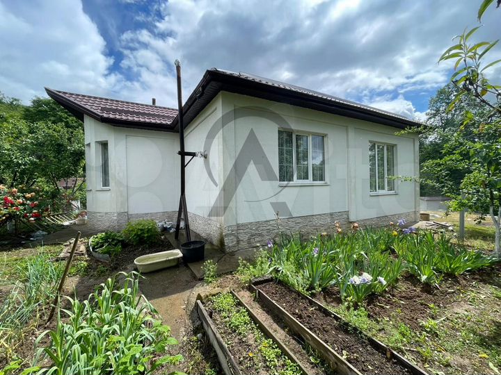 Дом 93,9 м² на участке 14,4 сот.