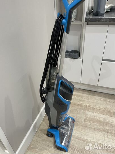 Моющий вертикальный пылесос Bissell