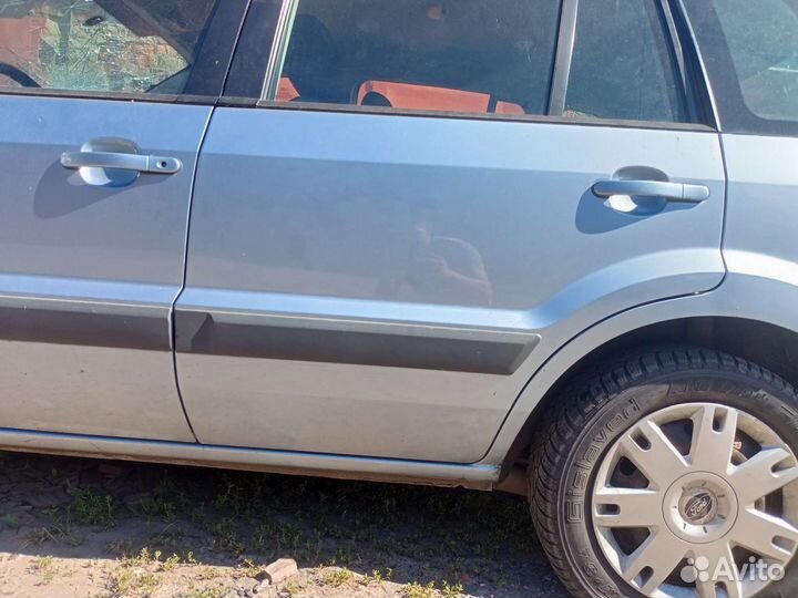 Двери на Ford Fusion рестайлинг