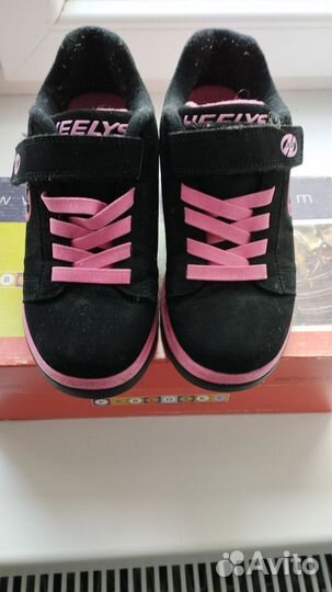 Кроссовки на роликах heelys