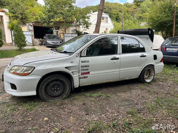 Запчасти на mitsubishi lancer цедия