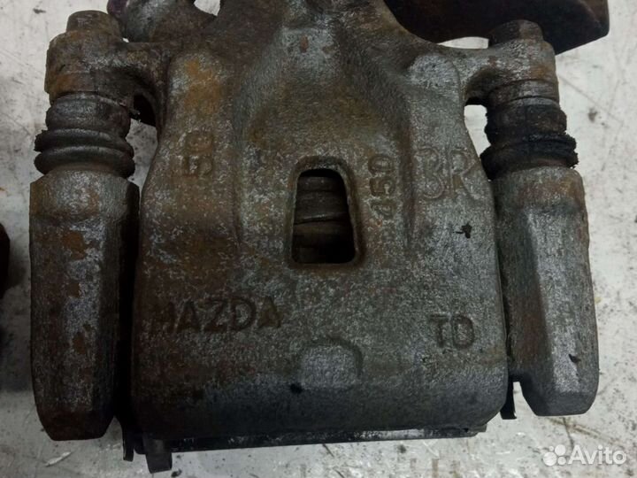 Суппорт тормозной задний mazda CX 5