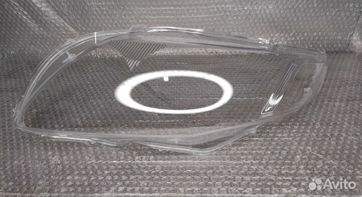 Стекло фары Toyota Corolla E150