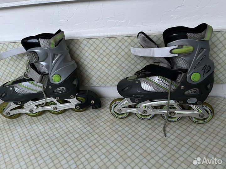 Роликовые коньки