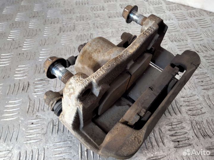 Суппорт передний левый Nissan x-trail t31