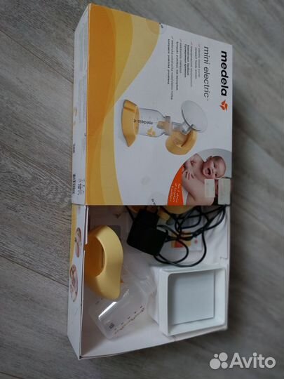 Молокоотсос medela электрический