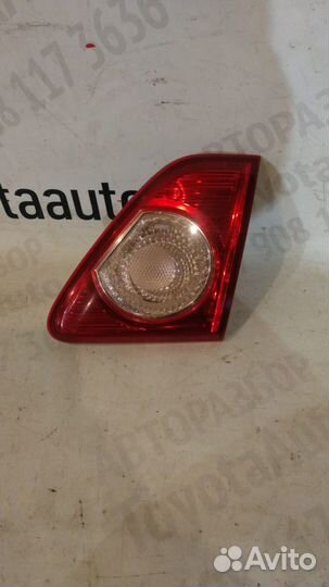 Фонарь в крышку багажника Тойота Королла Е150