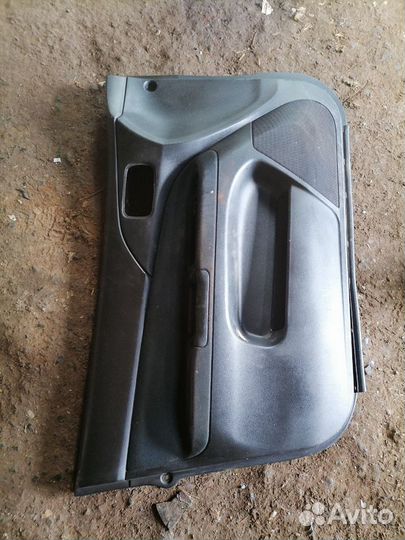 Обшивка двери передней левой Mitsubishi Lancer 9 2