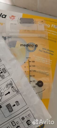 Молокоотсос medela электрический