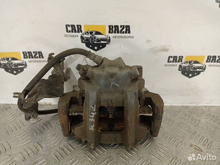 Суппорт тормозной передний левый L BMW 1