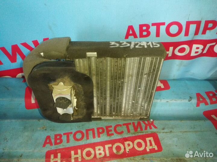 Радиатор печки отопителя Ниссан Тиида