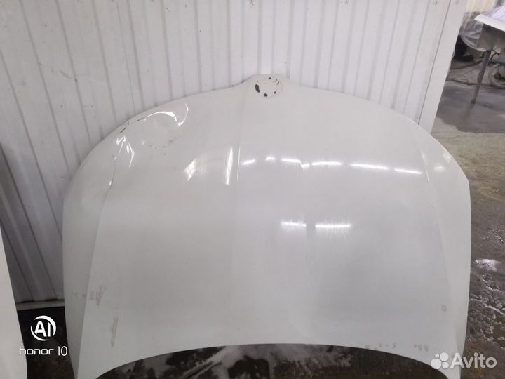 Капот Skoda Rapid