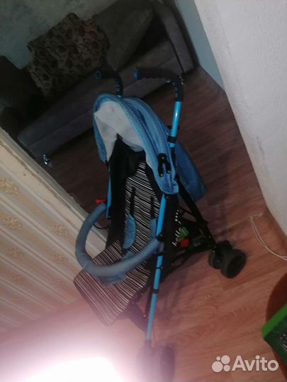 Прогулочная коляска трость