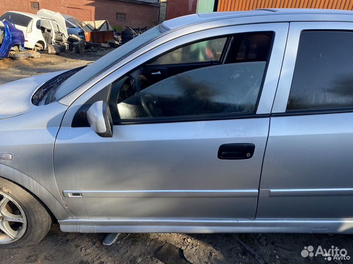 Дверь передняя левая Opel Astra G