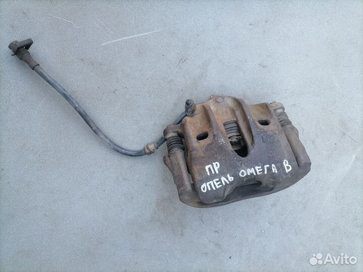 Суппорт тормозной передний правый для Opel Omega B