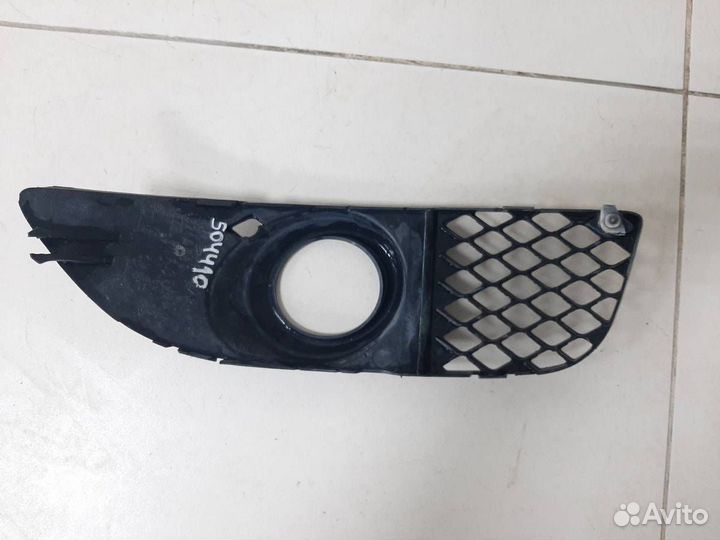 Рамка противотуманной фары левой Mitsubishi Lancer