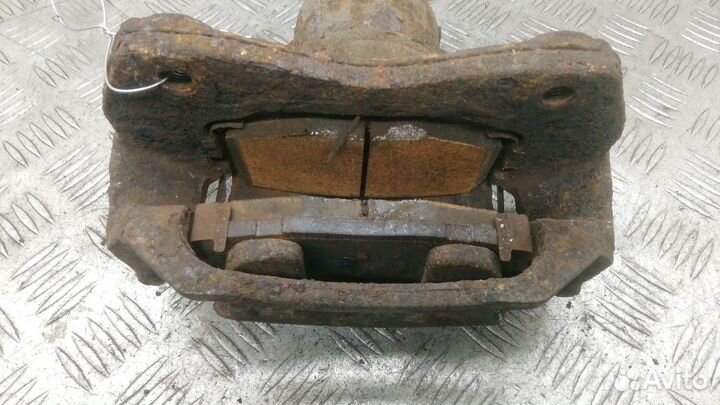 Суппорт передний левый Kia Ceed 2010