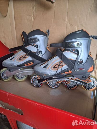 Роликовые коньки