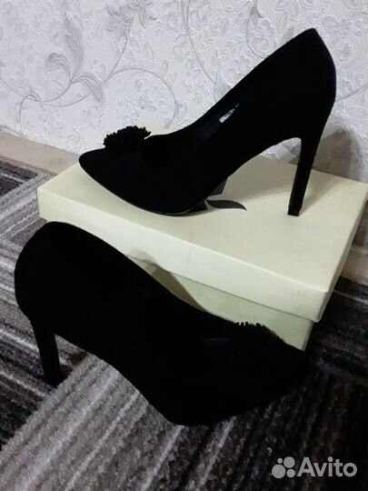 Туфли на высоком каблуке