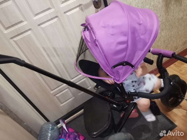 Трехколесный велосипед с ручкой